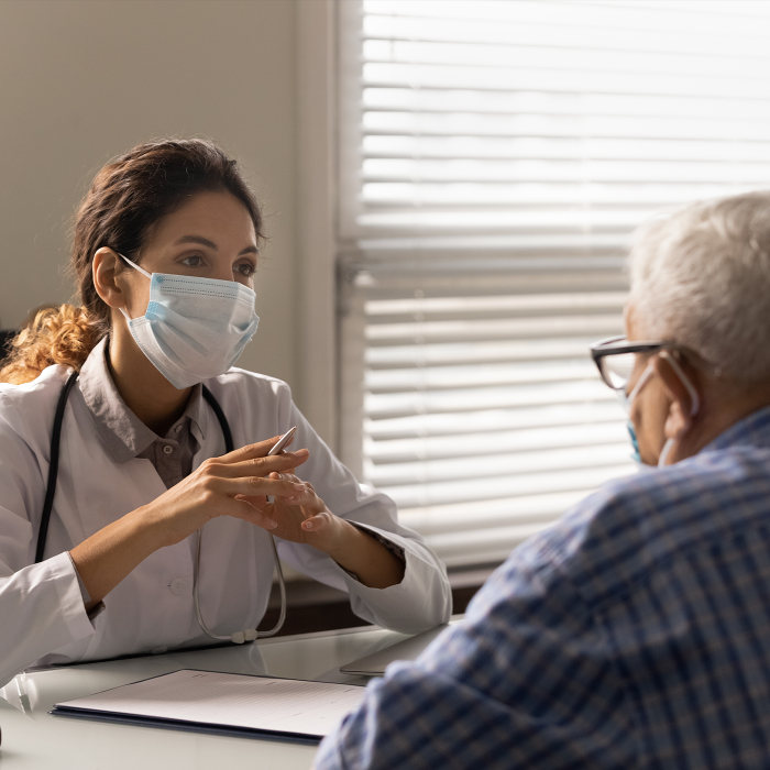 Doctor talks to her patient 