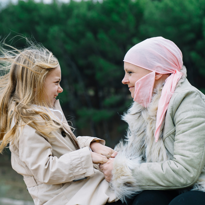 woman with cancer and child