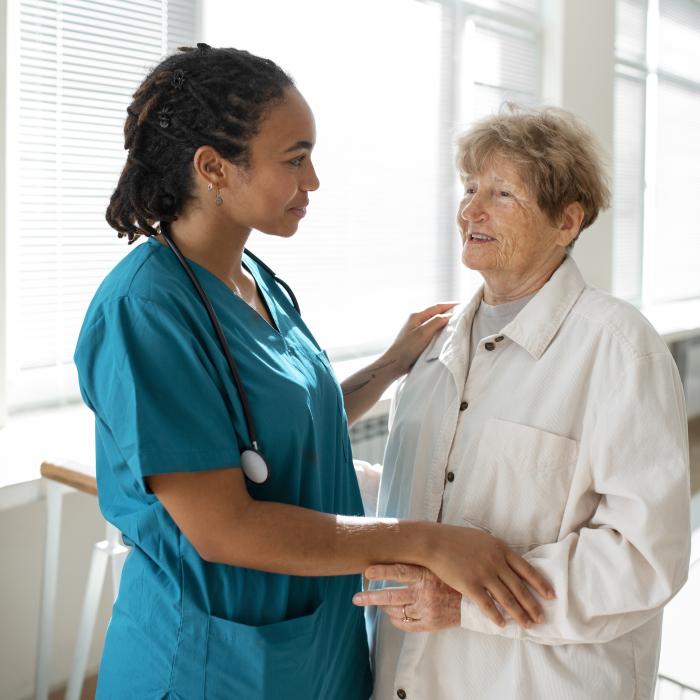 Doctor talking with patient