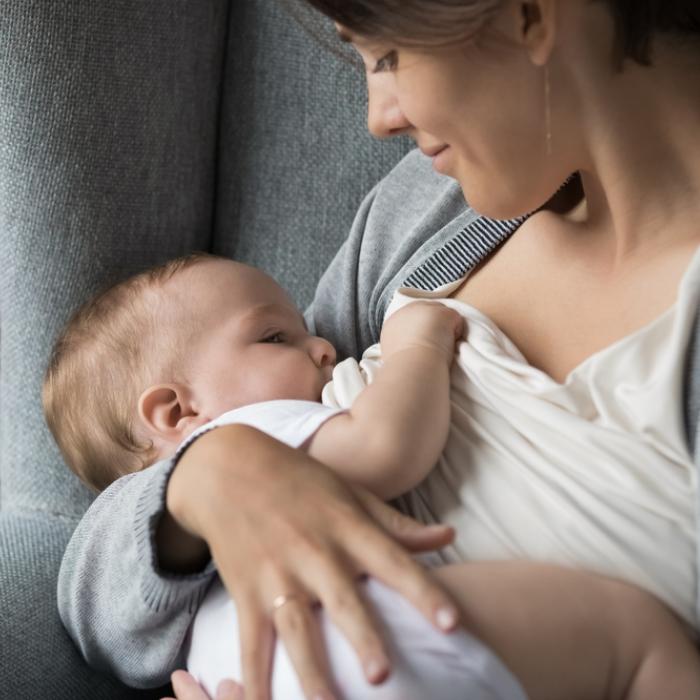 Mother breastfeeding baby